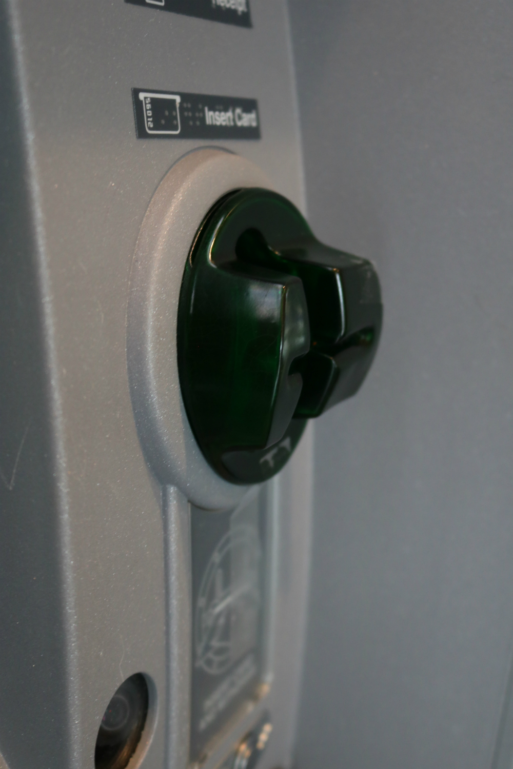 ATM card reader with a skimmer