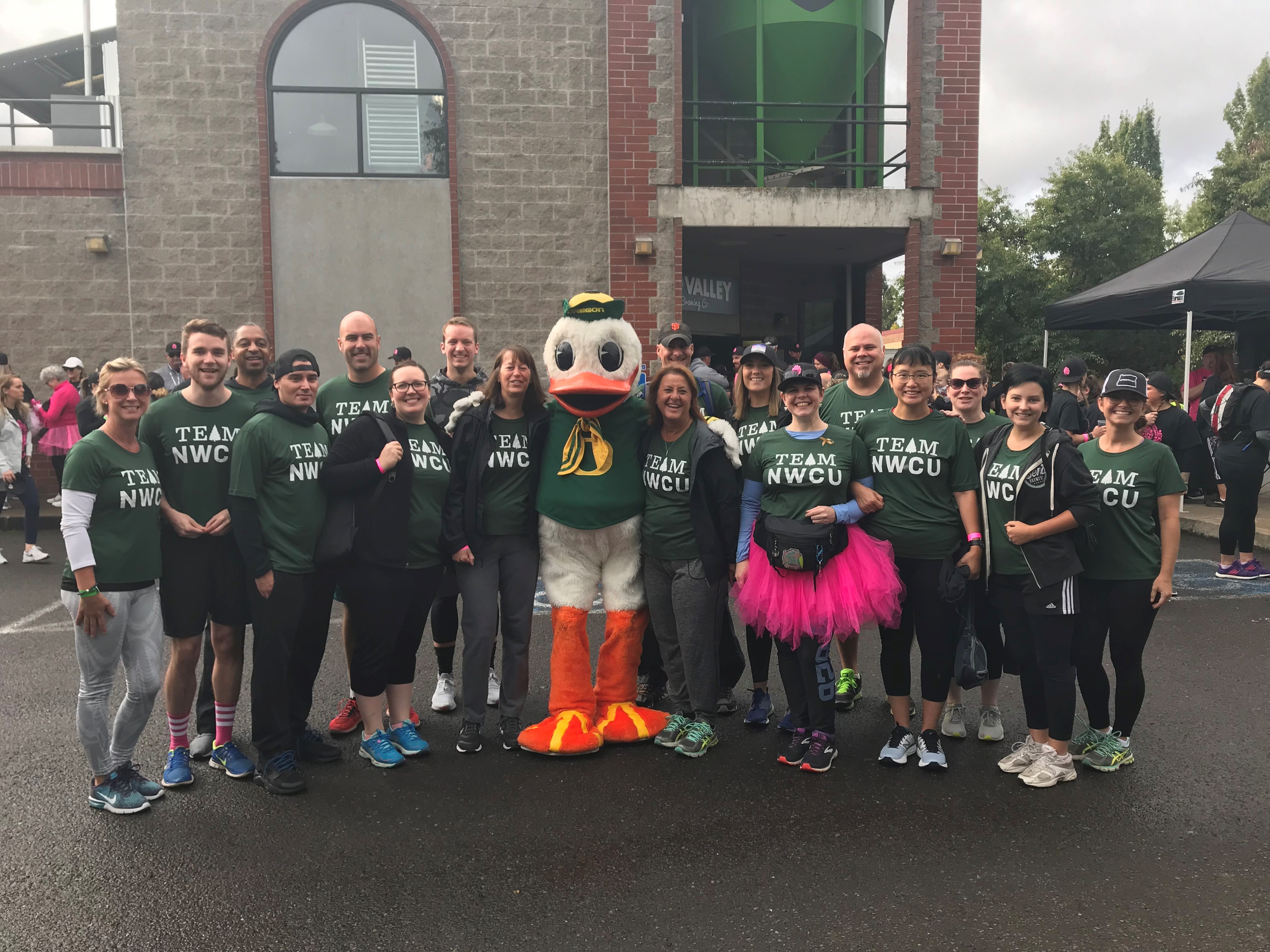 2019 NWCU Team with the Oregon Duck mascot at Hop to Hop